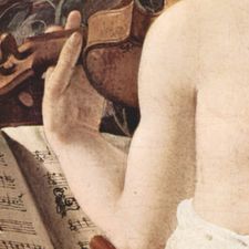 Man holding score for violinist