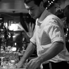 Bartender cleaning up